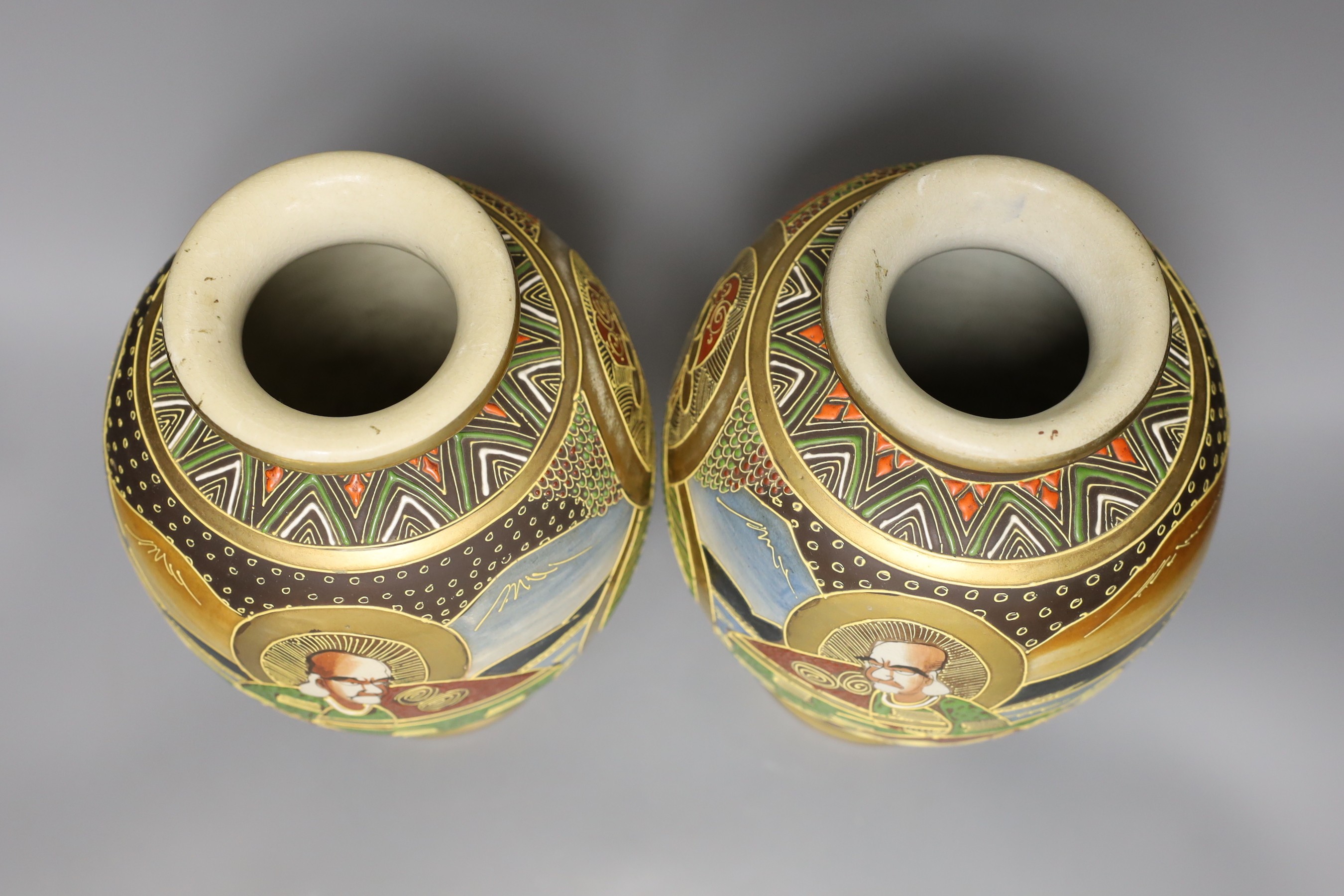 A pair of Satsuma pottery vases, 31cm tall